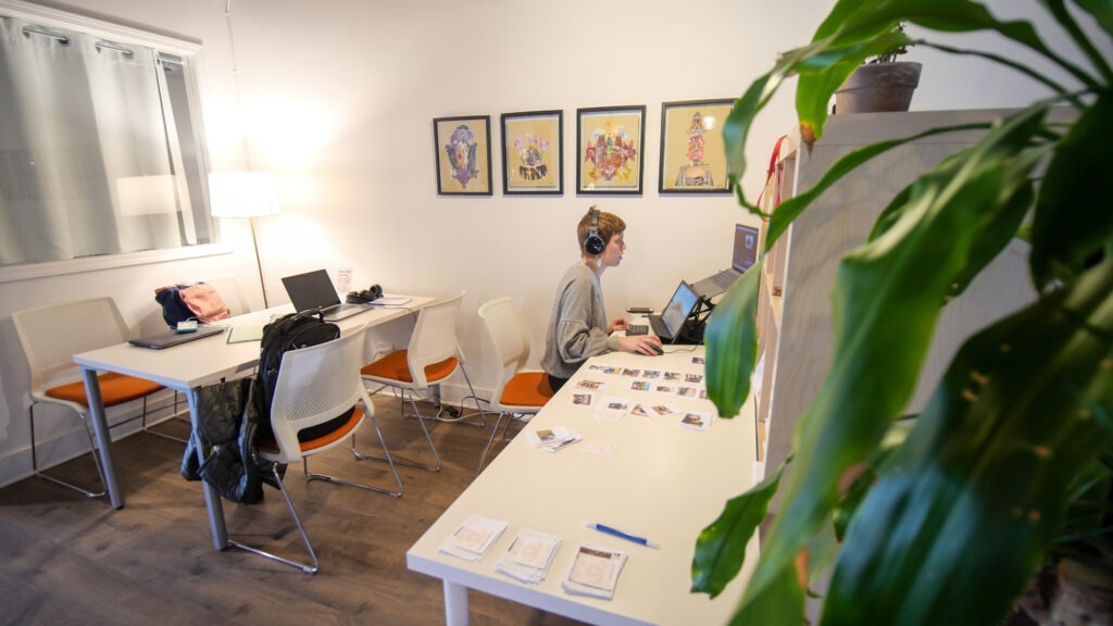 Person coworking at Second Shift's private offices for rent in Chicago