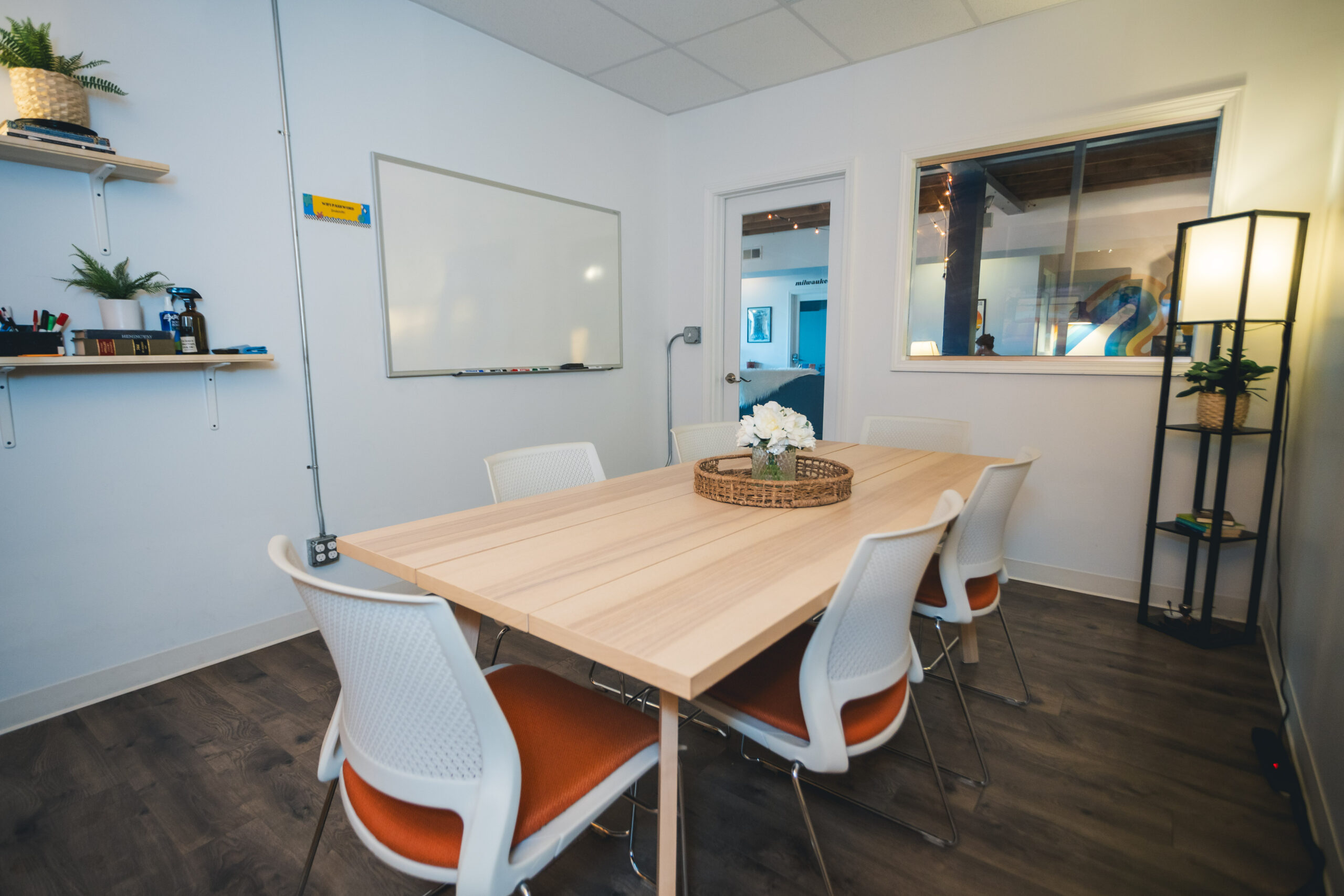 Office spaces for rent with windows at Chicago's Logan Square coworking space.